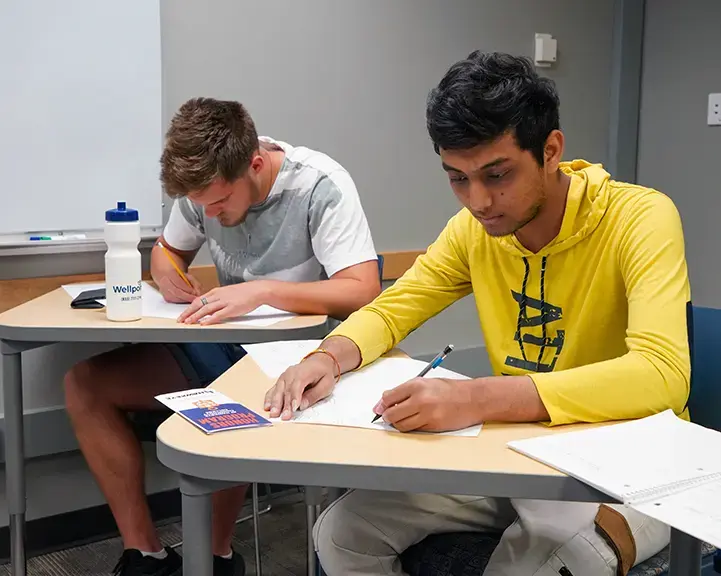 Students work on an independent project in a communications class.